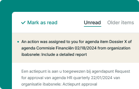 A close-up of an email notification on a screen, showing an assignment with agenda details from an organization, partially in Dutch.